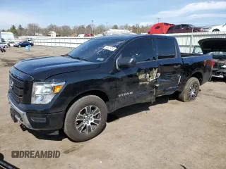 2024 Nissan Titan SV with VIN 1N6AA1EC2RN101063, listed as a Copart auction lot 49879235 with 12,418 mi miles and Salvage title. Bid and sale history available at DreamBid. Image 1.