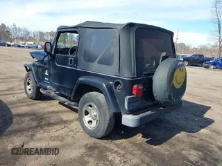 2003 Jeep Wrangler X with VIN 1J4FA39S53P362991, listed as a IAAI auction lot 41607212 with 240,556 mi miles. Bid and sale history available at carsss.com. Image 3.