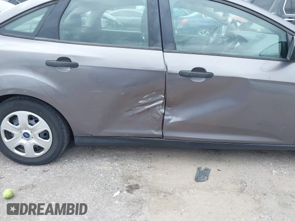 2012 Ford Focus S with VIN 1FAHP3E23CL166063, listed as a IAAI auction lot 40716406 with 191,392 mi miles and . Bid and sale history available at DreamBid. Image 6.