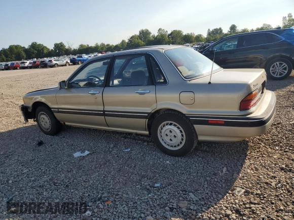 1989 Mitsubishi Galant with VIN JA3BR56V1KZ052149, listed as a Copart auction lot 69987544 with 74,232 mi miles and Salvage Title. Bid and sale history available at DreamBid. Image 2.