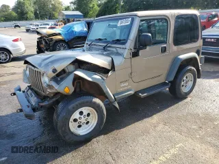 2003 Jeep Wrangler Sport Right Hand Drive z VIN 1J4F449S93P336469, wystawiony jako Copart lot #56912655 z przebiegiem 230 763 mil mil oraz Nie do naprawy • Non repairable. Historia ofert i sprzedaży dostępna na DreamBid. Obrazek 1.