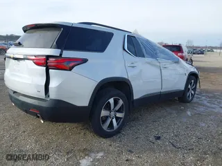 2022 Chevrolet Traverse LT Leather with VIN 1GNEVHKW6NJ130204, listed as a IAAI auction lot 41357252 with 74,938 mi miles. Bid and sale history available at carsss.com. Image 4.