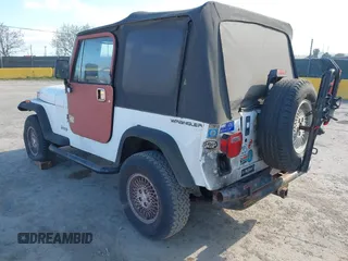 1995 Jeep Wrangler S with VIN 1J4FY19P6SP210468, listed as a IAAI auction lot 41882009 with 133,705 mi miles. Bid and sale history available at carsss.com. Image 3.