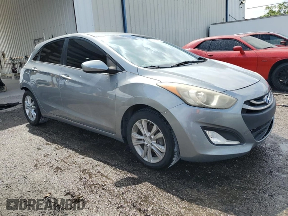 2014 Hyundai Elantra GT with VIN KMHD35LH8EU233076, listed as a Copart auction lot 54197065 with 116,871 mi miles and Salvage Title. Bid and sale history available at carsss.com. Image 4.