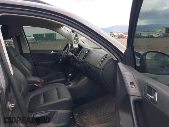 2016 Volkswagen Tiguan S with VIN WVGBV7AX6GW607716, listed as a IAAI auction lot 42085386 with 154,348 mi miles and . Bid and sale history available at DreamBid. Image 5.