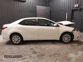 2019 Toyota Corolla L with VIN 5YFBURHE9KP871926, listed as a IAAI auction lot 42038212 with 72,475 mi miles and . Bid and sale history available at DreamBid. Image 13.