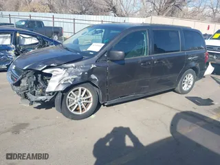 2016 Dodge Grand Caravan SXT with VIN 2C4RDGCG2GR265774, listed as a IAAI auction lot 41763444 with 142,700 mi miles. Bid and sale history available at carsss.com. Image 2.