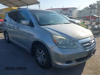 2007 Honda Odyssey EX with VIN 5FNRL38427B072630, listed as a IAAI auction lot 41962603 with 246,027 mi miles. Bid and sale history available at carsss.com. Image 1.