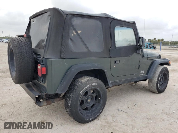 2003 Jeep Wrangler SE with VIN 1J4FA29103P313229, listed as a Copart auction lot 79337984 with 135,668 mi miles and Salvage title. Bid and sale history available at DreamBid. Image 3.