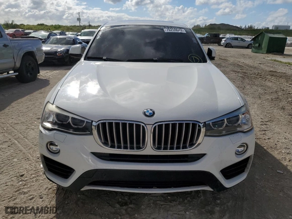 2016 BMW X4 xDrive28i with VIN 5UXXW3C57G0M90063, listed as a Copart auction lot 70259642 with 74,060 mi miles. Bid and sale history available at carsss.com. Image 5.