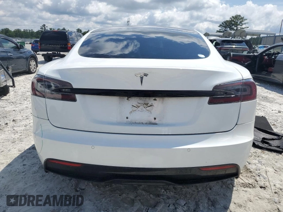2021 Tesla Model S Long Range with VIN 5YJSA1E52MF443953, listed as a Copart auction lot 59838715 with 54,643 mi miles and Salvage title. Bid and sale history available at DreamBid. Image 6.