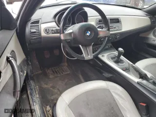 2003 BMW Z4 2.5i with VIN 4USBT33413LR63440, listed as a Copart auction lot 49595295 with 119,717 mi miles and Salvage Title. Bid and sale history available at carsss.com. Image 8.
