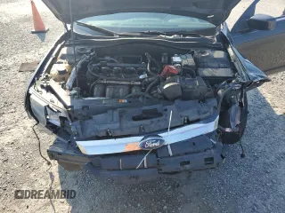 2012 Ford Fusion SE z VIN 3FAHP0HA9CR273430, wystawiony jako Copart lot #62766575 z przebiegiem 212 399 mil mil oraz Szkoda całkowita • Salvage title. Historia ofert i sprzedaży dostępna na DreamBid. Obrazek 13.