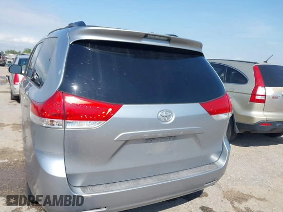 2011 Toyota Sienna XLE AAS with VIN 5TDYK3DC3BS007690, listed as a IAAI auction lot 42044640 with 253,359 mi miles. Bid and sale history available at carsss.com. Image 16.