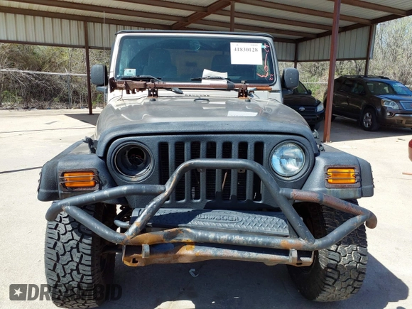 2005 Jeep Wrangler Sport with VIN 1J4FA49S45P345673, listed as a IAAI auction lot 41830128 with 139,432 mi miles. Bid and sale history available at carsss.com. Image 6.