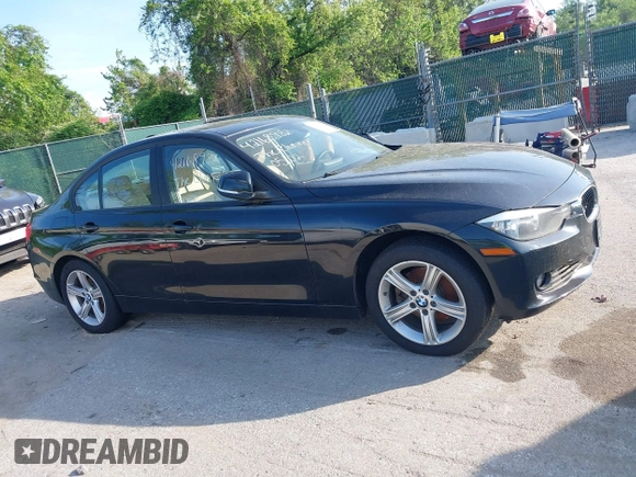 2014 BMW 3 Series 328i xDrive with VIN WBA3B5G56ENS06890, listed as a IAAI auction lot 42168982 with 133,664 mi miles. Bid and sale history available at carsss.com. Image 13.