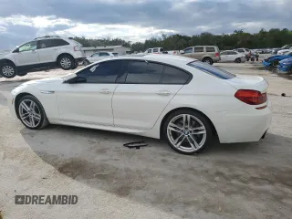 2016 BMW 6 Series 640i with VIN WBA6D0C57GG432671, listed as a Copart auction lot 86781034 with 118,161 mi miles and Salvage Title. Bid and sale history available at carsss.com. Image 2.