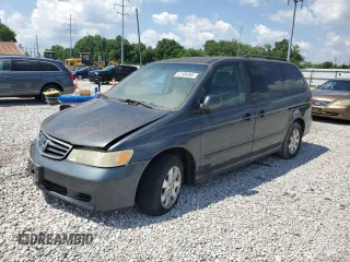 2004 Honda Odyssey EX with VIN 5FNRL18604B144894, listed as a Copart auction lot 63105365 with 209,234 mi miles and Clean title. Bid and sale history available at DreamBid. Image 1.