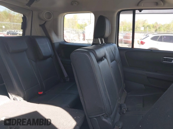 2013 Honda Pilot Touring with VIN 5FNYF4H97DB069979, listed as a IAAI auction lot 42133922 with 276,574 mi miles and . Bid and sale history available at carsss.com. Image 8.