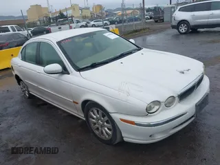 2003 Jaguar X-Type 2.5L Manual with VIN SAJEA51D33XD32869, listed as a IAAI auction lot 41484180 with 192,774 mi miles and . Bid and sale history available at DreamBid. Image 1.