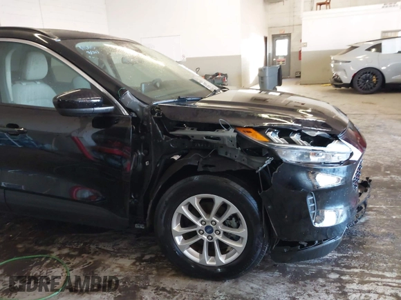 2020 Ford Escape SE with VIN 1FMCU9G6XLUC71527, listed as a IAAI auction lot 41420952 with 70,886 mi miles and . Bid and sale history available at DreamBid. Image 18.