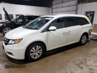 2015 Honda Odyssey with VIN 5FNRL5H68FB042107, listed as a Copart auction lot 51000525 with 140,793 mi miles and Salvage Title. Bid and sale history available at DreamBid. Image 1.