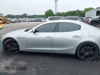2015 Maserati Ghibli S Q4 with VIN ZAM57RTA2F1146411, listed as a IAAI auction lot 42359547 with 95,937 mi miles and . Bid and sale history available at DreamBid. Image 14.
