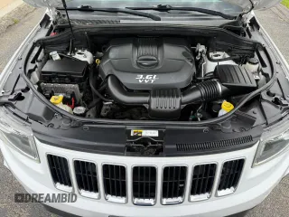 2014 Jeep Grand Cherokee Limited with VIN 1C4RJFBG9EC155122, listed as a Copart auction lot 63812735 with 164,061 mi miles and Clean title. Bid and sale history available at DreamBid. Image 7.