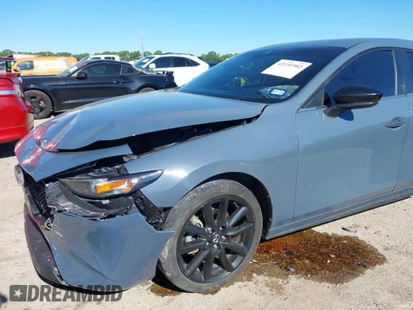 2023 Mazda 3 S Carbon Edition with VIN JM1BPBLM8P1611106, listed as a IAAI auction lot 42191902 with 37,244 mi miles and . Bid and sale history available at DreamBid. Image 6.