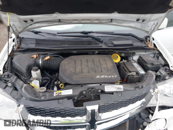 2017 Dodge Grand Caravan SXT with VIN 2C4RDGCG2HR645439, listed as a IAAI auction lot 42141378 with 161,518 mi miles and . Bid and sale history available at DreamBid. Image 10.