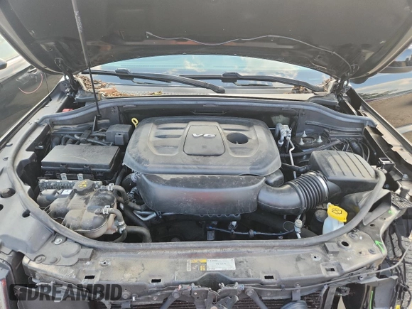 2018 Jeep Grand Cherokee Laredo E z VIN 1C4RJFAGXJC287415, wystawiony jako Copart lot #64182975 z przebiegiem 103 817 mil mil oraz Szkoda całkowita • Salvage title. Historia ofert i sprzedaży dostępna na DreamBid. Obrazek 12.