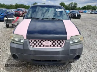 2005 Ford Escape XLS Value with VIN 1FMYU92Z95DA22100, listed as a Copart auction lot 57874705 with 192,057 mi miles and Salvage title. Bid and sale history available at DreamBid. Image 5.