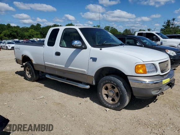 2004 Ford F-150 XL with VIN 2FTRX18W34CA64873, listed as a Copart auction lot 63946475 with 73,423 mi miles and Salvage title. Bid and sale history available at DreamBid. Image 4.
