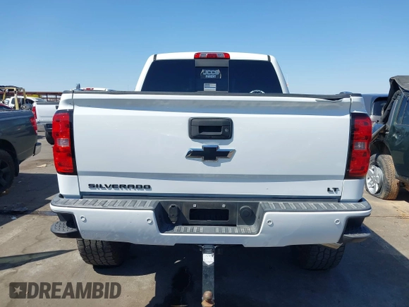 2016 Chevrolet Silverado 1500 LT with VIN 3GCUKREC5GG369915, listed as a IAAI auction lot 42082155 with 137,671 mi miles and . Bid and sale history available at DreamBid. Image 16.