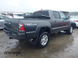2014 Toyota Tacoma PreRunner with VIN 5TFJU4GN7EX052421, listed as a IAAI auction lot 42360951 with 166,175 mi miles and . Bid and sale history available at DreamBid. Image 4.