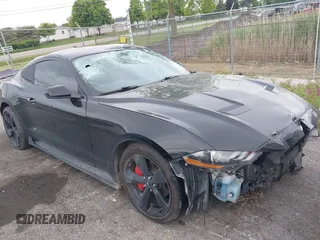 2021 Ford Mustang EcoBoost with VIN 1FA6P8TH7M5132841, listed as a IAAI auction lot 42364830 with 22,331 mi miles and . Bid and sale history available at DreamBid. Image 1.