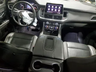 2021 GMC Yukon XL SLT with VIN 1GKS2GKDXMR371393, listed as a Copart auction lot 85052824 with 104,432 mi miles and Salvage Title. Bid and sale history available at carsss.com. Image 8.