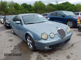2003 Jaguar S-Type with VIN SAJEA01U33HM70079, listed as a IAAI auction lot 41939388 with 147,975 mi miles and . Bid and sale history available at DreamBid. Image 1.