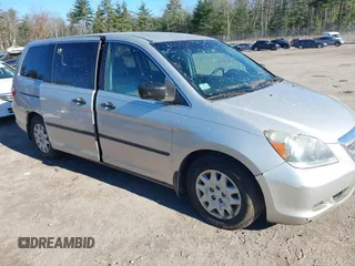 2005 Honda Odyssey LX z VIN 5FNRL382X5B097268, wystawiony jako IAAI lot #40809971 z przebiegiem 286 685 mil mil oraz . Historia ofert i sprzedaży dostępna na DreamBid. Obrazek 1.