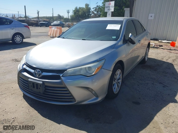 2015 Toyota Camry XLE with VIN 4T4BF1FK9FR499888, listed as a IAAI auction lot 41676657 with 148,310 mi miles. Bid and sale history available at carsss.com. Image 19.