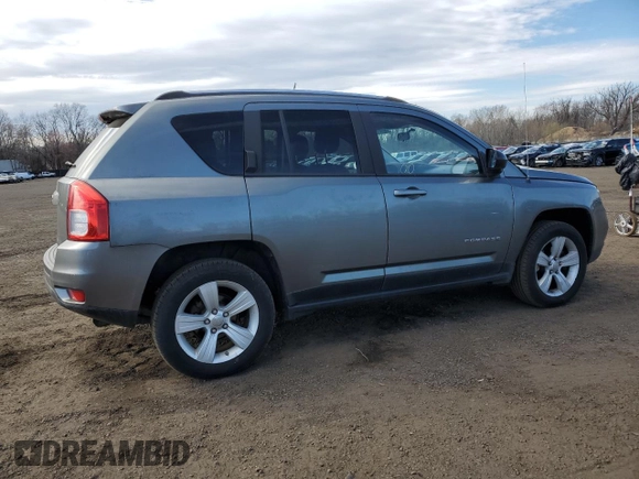 2012 Jeep Compass Sport with VIN 1C4NJDBB1CD562477, listed as a Copart auction lot 50935955 with 79,619 mi miles and Salvage Title. Bid and sale history available at carsss.com. Image 3.