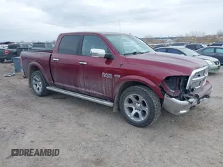 2018 Ram 1500 Laramie z VIN 1C6RR7NT0JS197001, wystawiony jako IAAI lot #41153559 z przebiegiem 112 531 mil mil oraz . Historia ofert i sprzedaży dostępna na DreamBid. Obrazek 1.