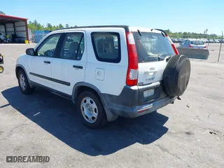 2006 Honda CR-V LX with VIN JHLRD68546C026819, listed as a IAAI auction lot 41883259 with 136,150 mi miles. Bid and sale history available at carsss.com. Image 3.