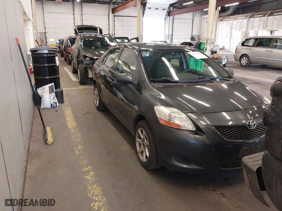 2010 Toyota Yaris with VIN JTDBT4K33A1354492, listed as a IAAI auction lot 40736581 with 228,018 mi miles. Bid and sale history available at carsss.com. Image 1.