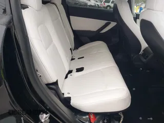 2021 Tesla Model Y Standard Range with VIN 5YJYGDED8MF123246, listed as a IAAI auction lot 41291676 with 74,630 mi miles and . Bid and sale history available at DreamBid. Image 8.