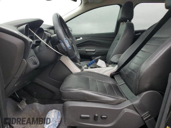 2013 Ford Escape SEL with VIN 1FMCU9H92DUA86916, listed as a Copart auction lot 63516415 with 167,791 mi miles and Salvage title. Bid and sale history available at DreamBid. Image 7.