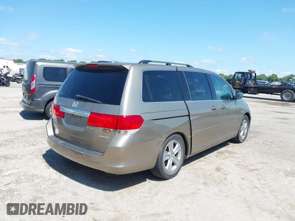 2010 Honda Odyssey Touring с VIN 5FNRL3H93AB069531, выставлен на аукционе IAAI как лот 42462835 с пробегом 241 297 миль миль и . История ставок и продаж доступна на DreamBid. Изображение 4.