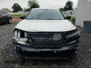 2023 Honda Civic Sport z VIN 19XFL2H88PE023552, wystawiony jako Copart lot #56878205 z przebiegiem 23 714 mil mil oraz Szkoda całkowita • Salvage title. Historia ofert i sprzedaży dostępna na DreamBid. Obrazek 5.