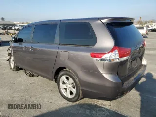 2012 Toyota Sienna with VIN 5TDKA3DC6CS010187, listed as a Copart auction lot 86885234 with 145,745 mi miles and Salvage Title. Bid and sale history available at DreamBid. Image 2.
