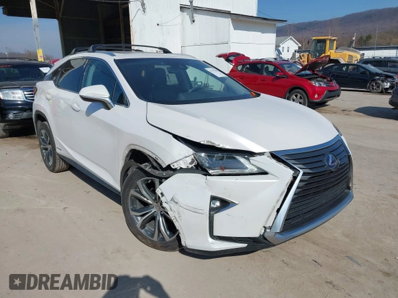 2016 Lexus RX 450h with VIN 2T2BGMCAXGC004844, listed as a IAAI auction lot 41791066 with 100,604 mi miles and . Bid and sale history available at DreamBid. Image 6.